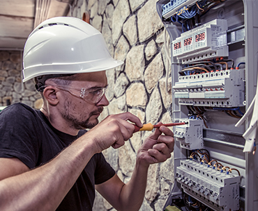 Man working with DB Board